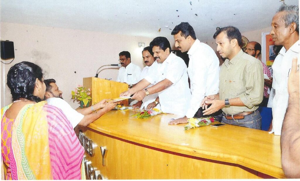 Receiving award from A.P. Anil Kumar,Ex Minister for Tourism